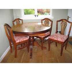 Ercol Extending Dining Room Table & 4 Chairs along with matching Display Cabinet