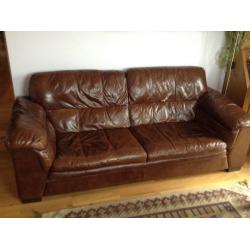 Dark brown leather three seater settee. Excellent condition.