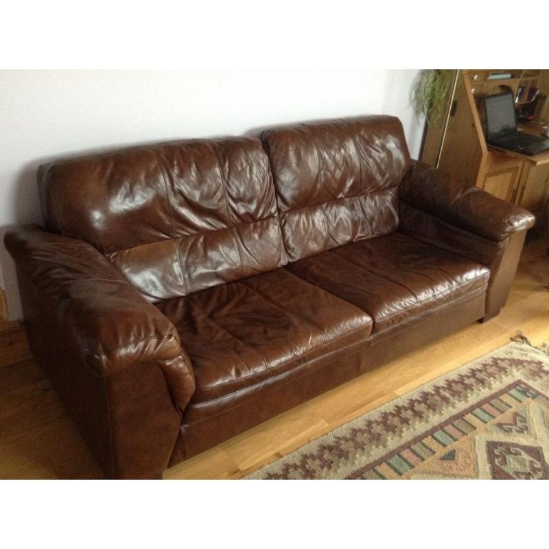 Dark brown leather three seater settee. Excellent condition.