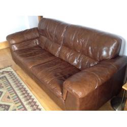 Dark brown leather three seater settee. Excellent condition.