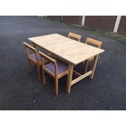 Ikea Solid light oak table with 4 chairs. Can deliver