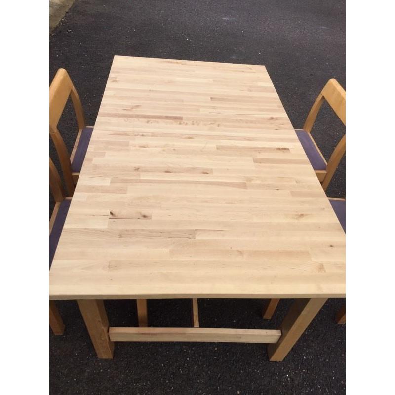 Ikea Solid light oak table with 4 chairs. Can deliver