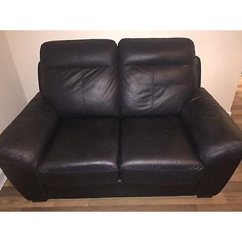 Black leather two seater sofa