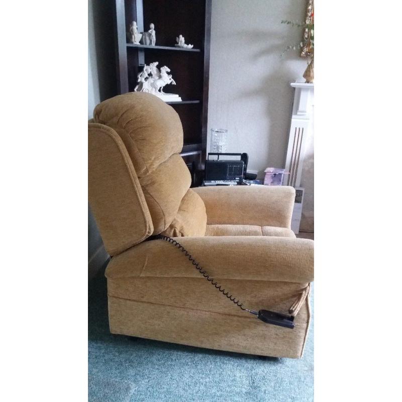 Electrically operated reclining chair in excellent condition. Gold / beige in colour