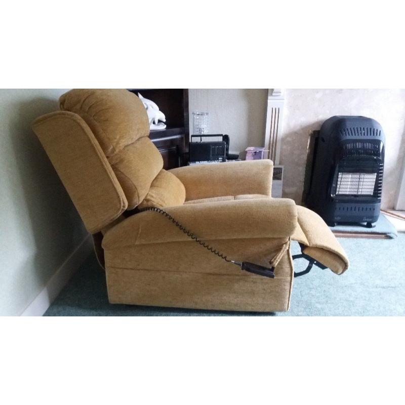 Electrically operated reclining chair in excellent condition. Gold / beige in colour