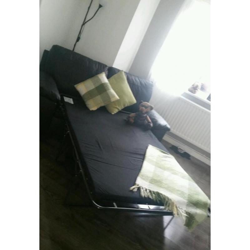 Leather three seater bed settee