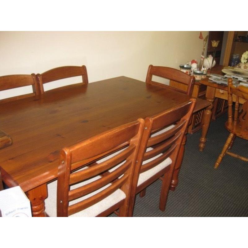 Pine table with 6 chairs.