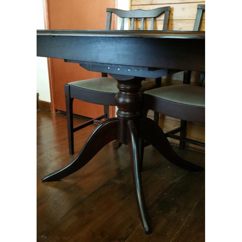 Stag Dining Table and 4 Chairs in very good condition - Expandable