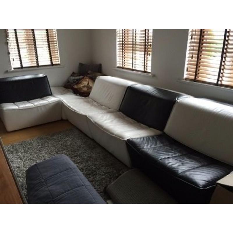 Black and white mix up couches