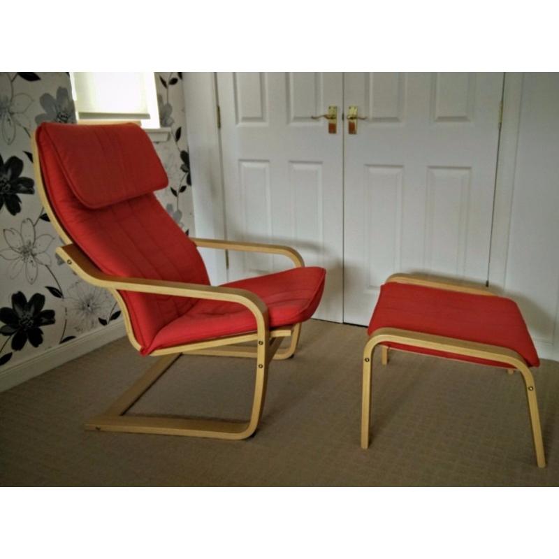 Red Ikea Poang chair and stool