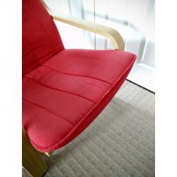 Red Ikea Poang chair and stool