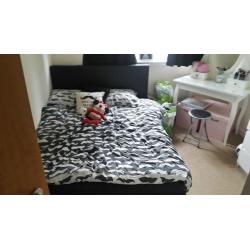 black leather double bed