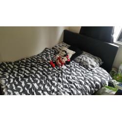 black leather double bed