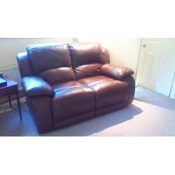 2 x leather sofa's fullly reclining in ver good condition , just under 2 years old