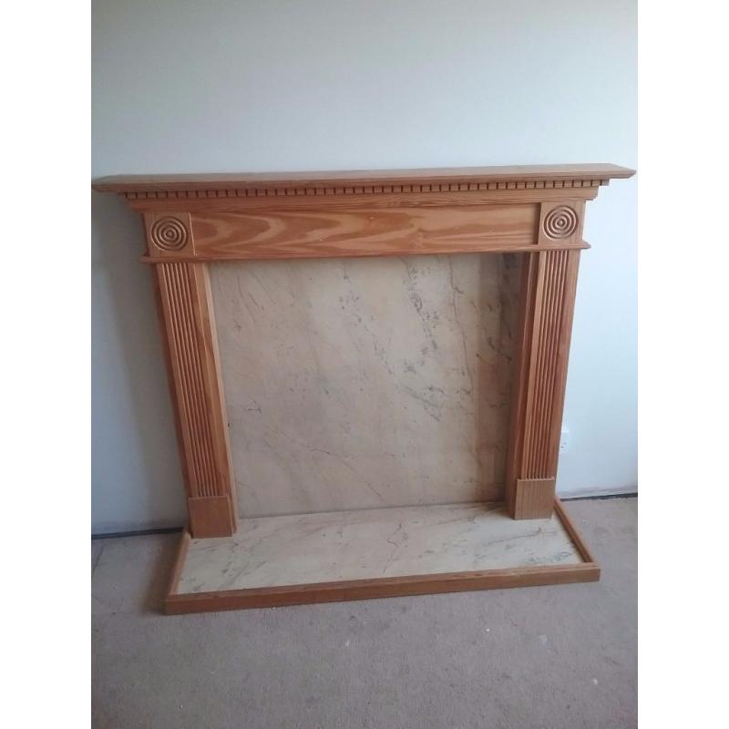 Pine fireplace surround can be painted or varnished.