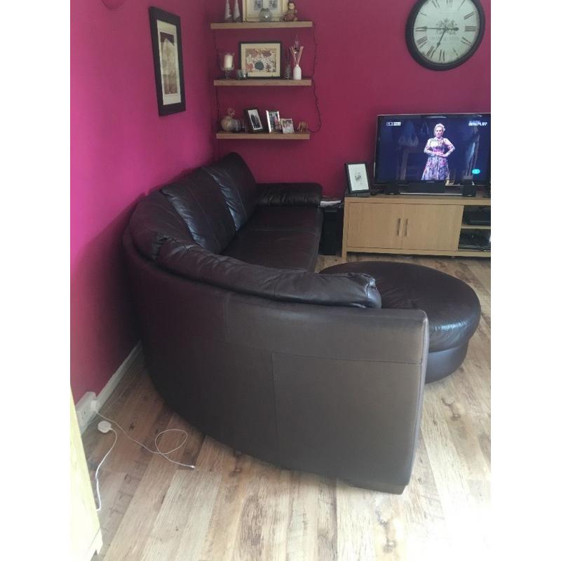 Large dark brown leather corner sofa and armchair