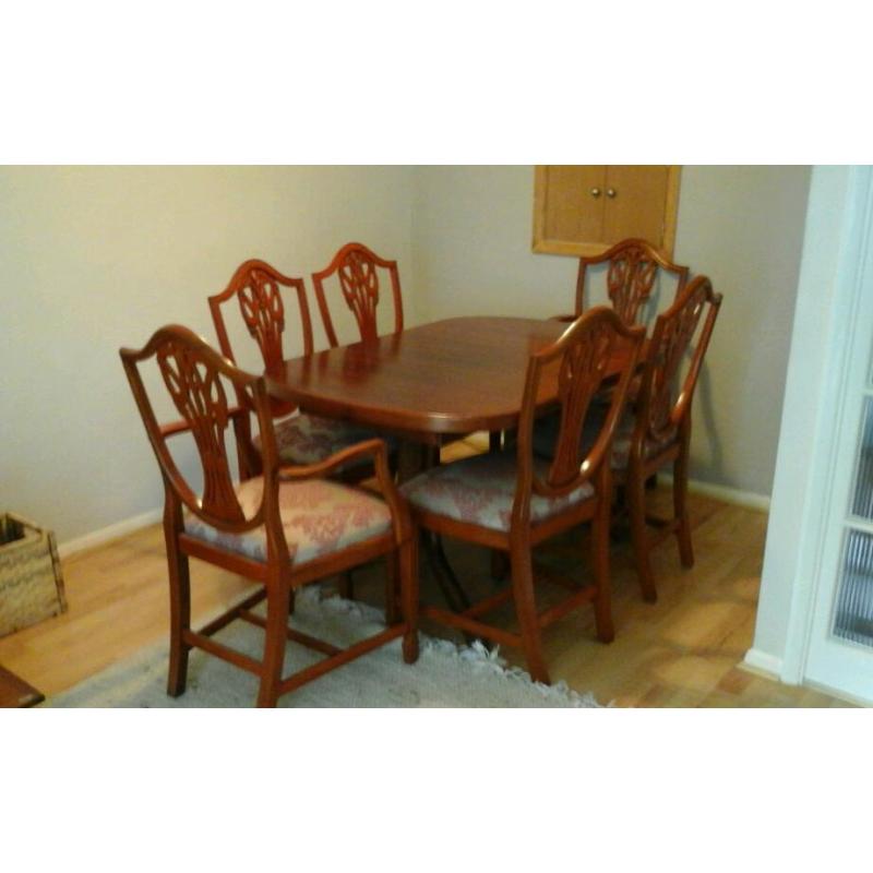 Extendable Dining table and 6 chairs