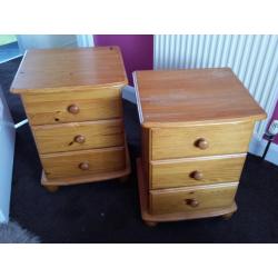 A pair of pine bedsides