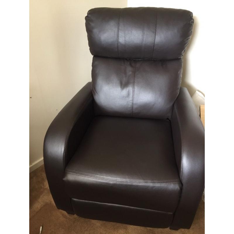 Pair or leather, brown reclining armchairs