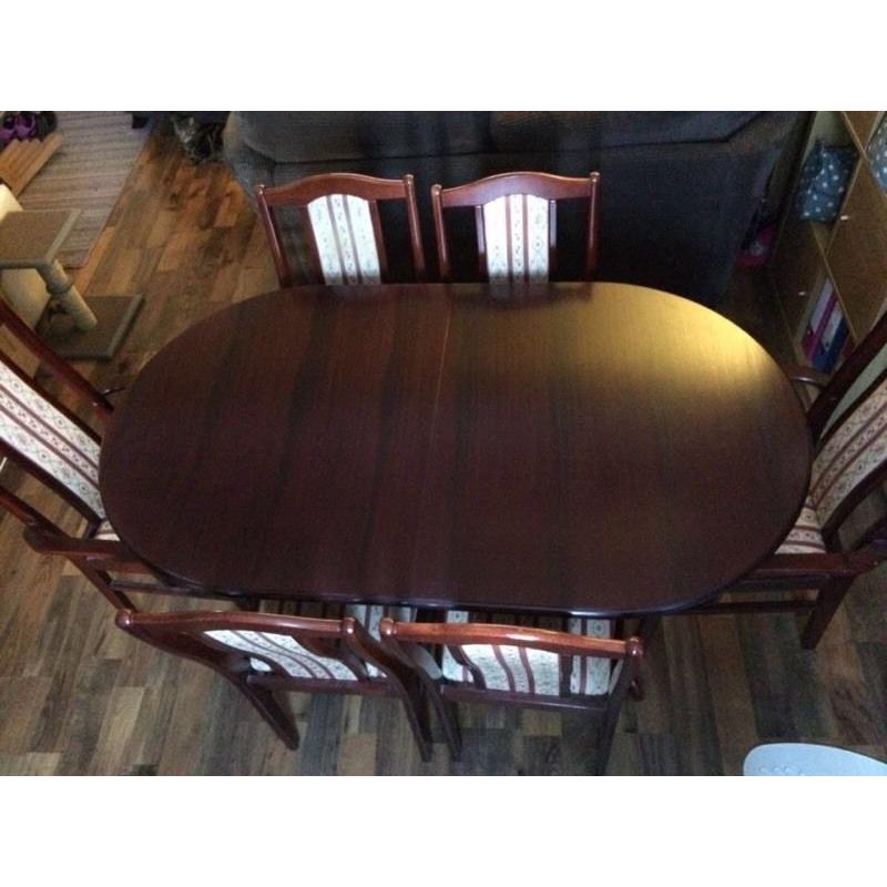 Extending table and 6 chairs