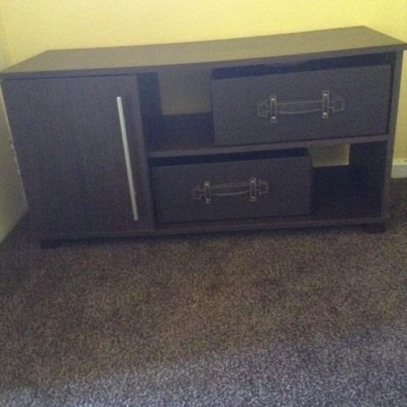 Brown TV stand with cupboard