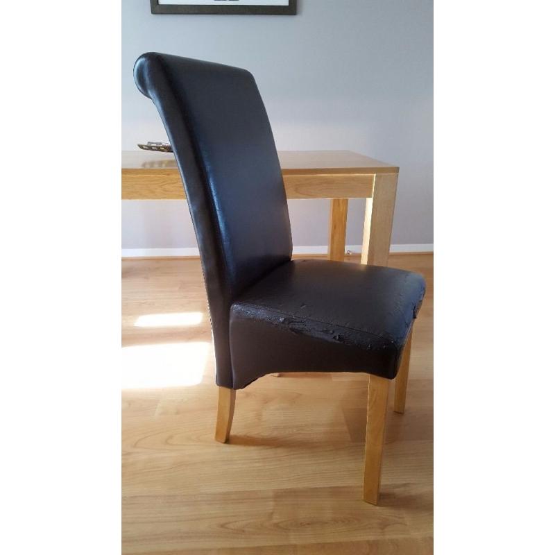 X4 brown leather roll top dining room chairs. Seat requires re-upholstered