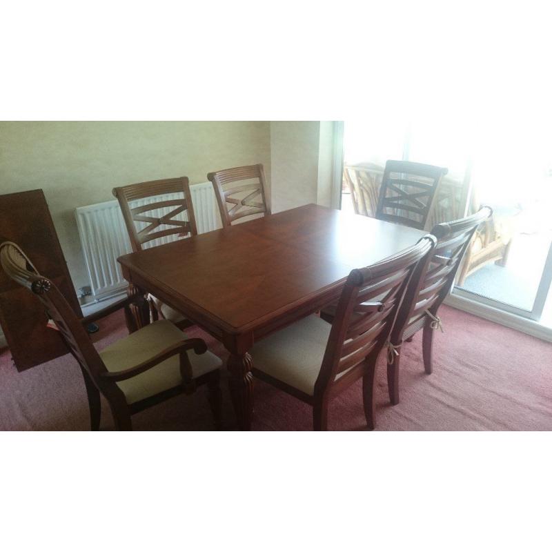 Mahogany effect dining table and six chairs