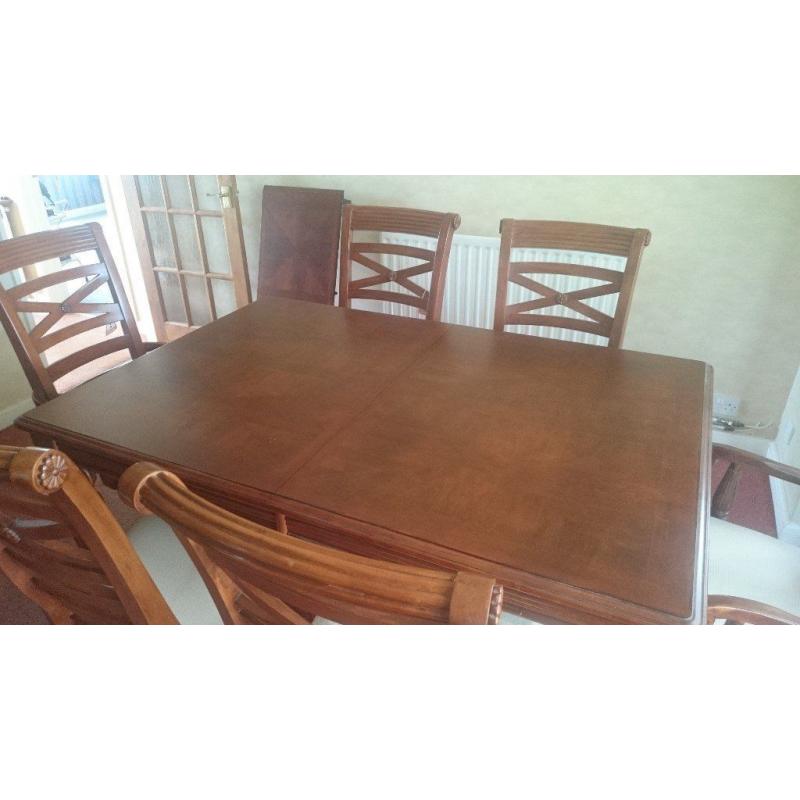 Mahogany effect dining table and six chairs