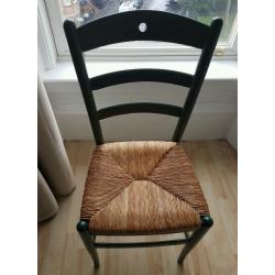 Wicker chair with green frame