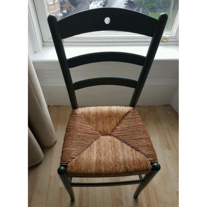 Wicker chair with green frame