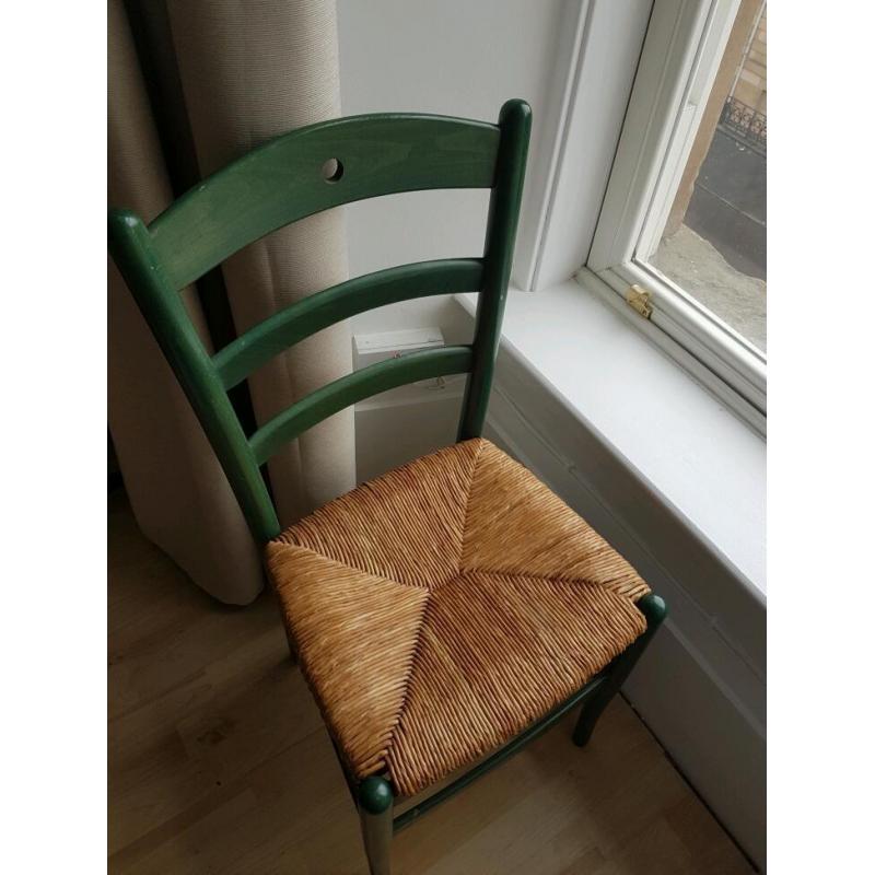 Wicker chair with green frame