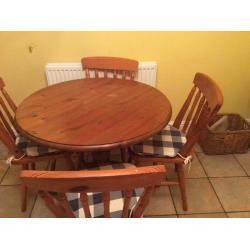 Round pine table with 4 chairs