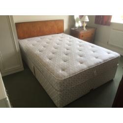 Double divan bed with mattress and headboard. Can deliver.