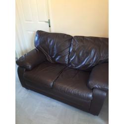 2 seater brown leather sofa.