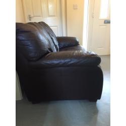 2 seater brown leather sofa.