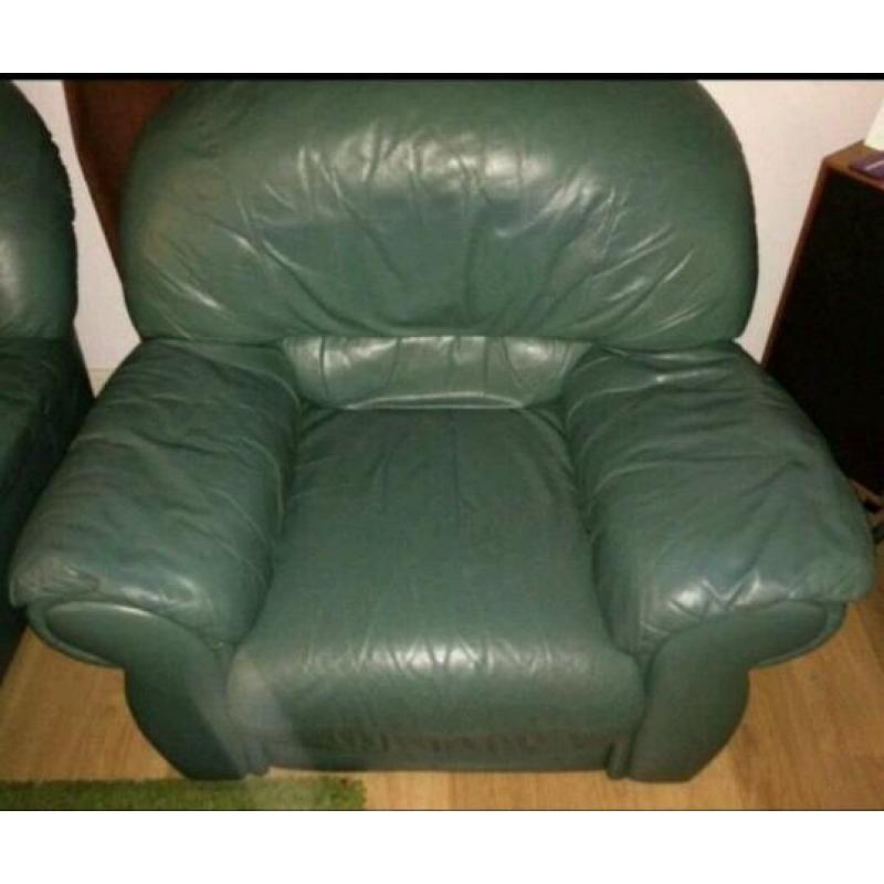 2 Large Leather Look Armchairs