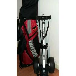 Golf clubs and trolley