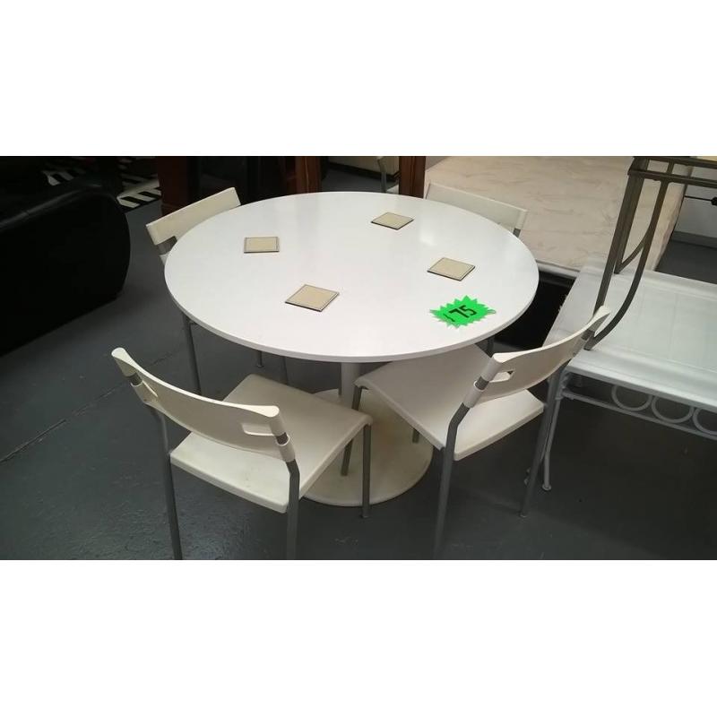 white dining table with 4 chairs