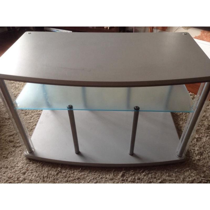 Silver TV stand in good condition.