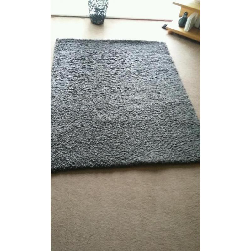 Large shaggy brown rug