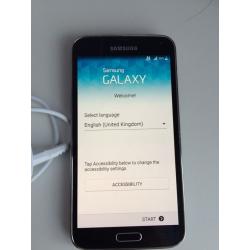 Samsung s5 with charger locked to EE