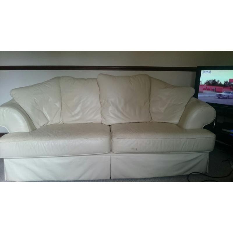 Cream three seater soft leather sofa