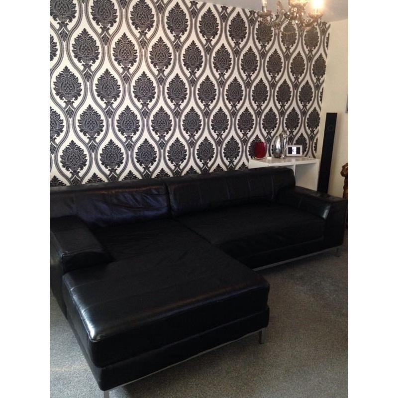 Large leather black corner sofa