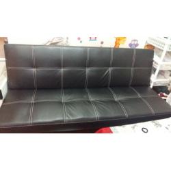 three seated Faux Leather black Sofa bed nearly new