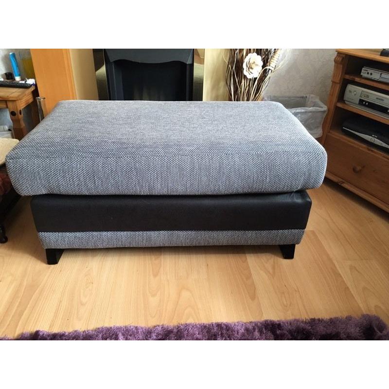 Light grey sofa/couch with grey chair and large stool