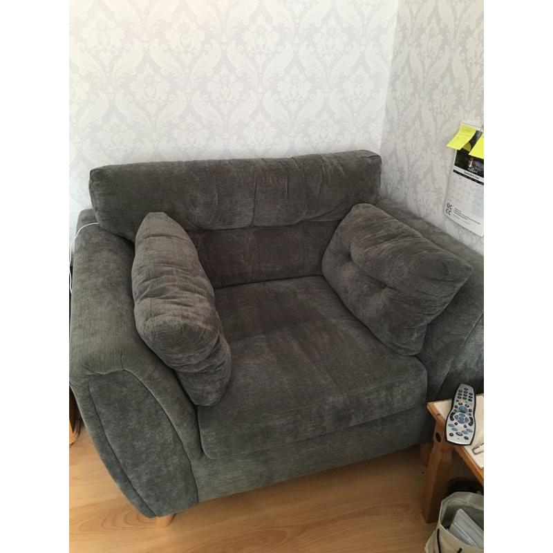 Light grey sofa/couch with grey chair and large stool