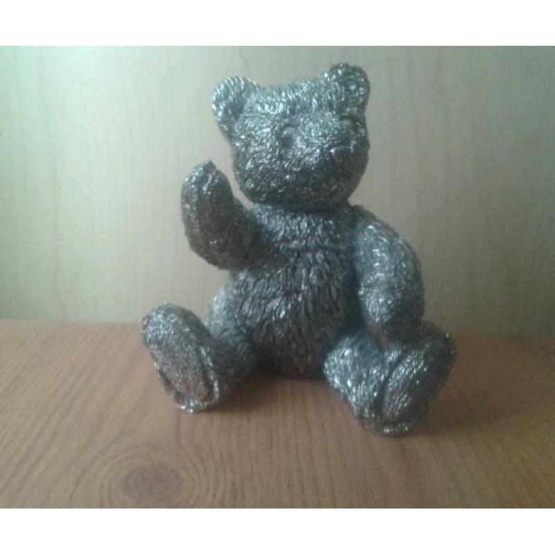 Decorative solid metal bear