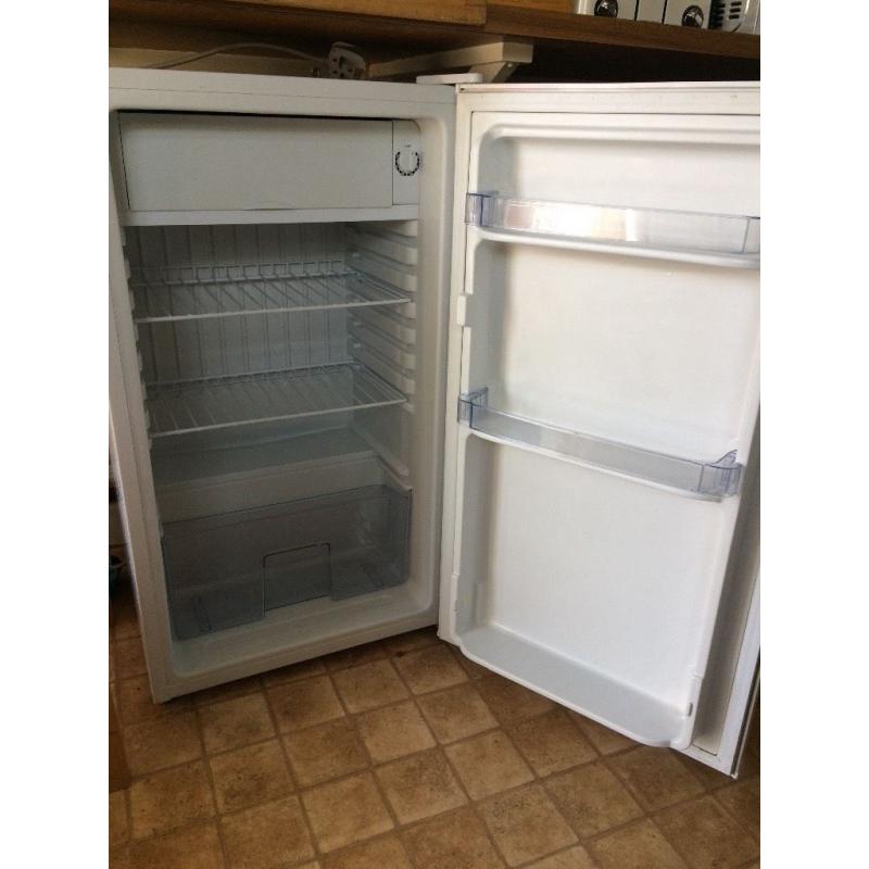 Fridge with small freezer compartment