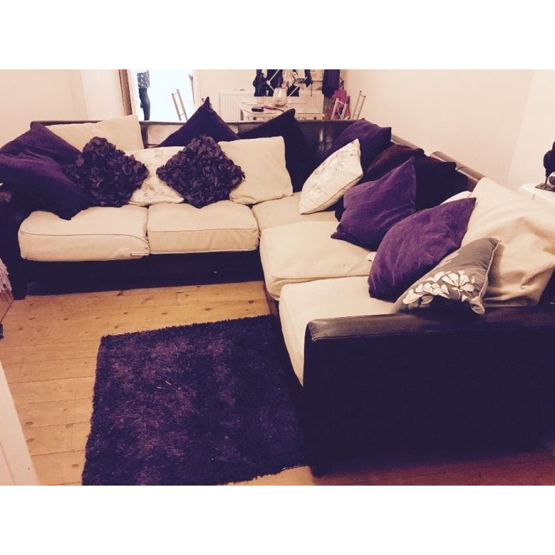 Stylish, decent size corner sofa with cushions