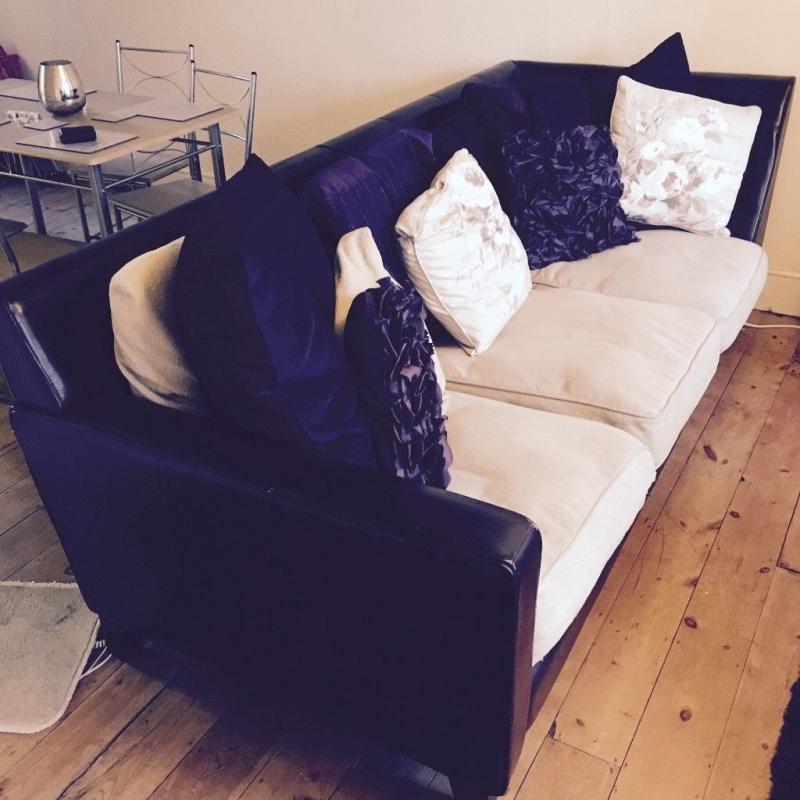 Stylish, decent size corner sofa with cushions